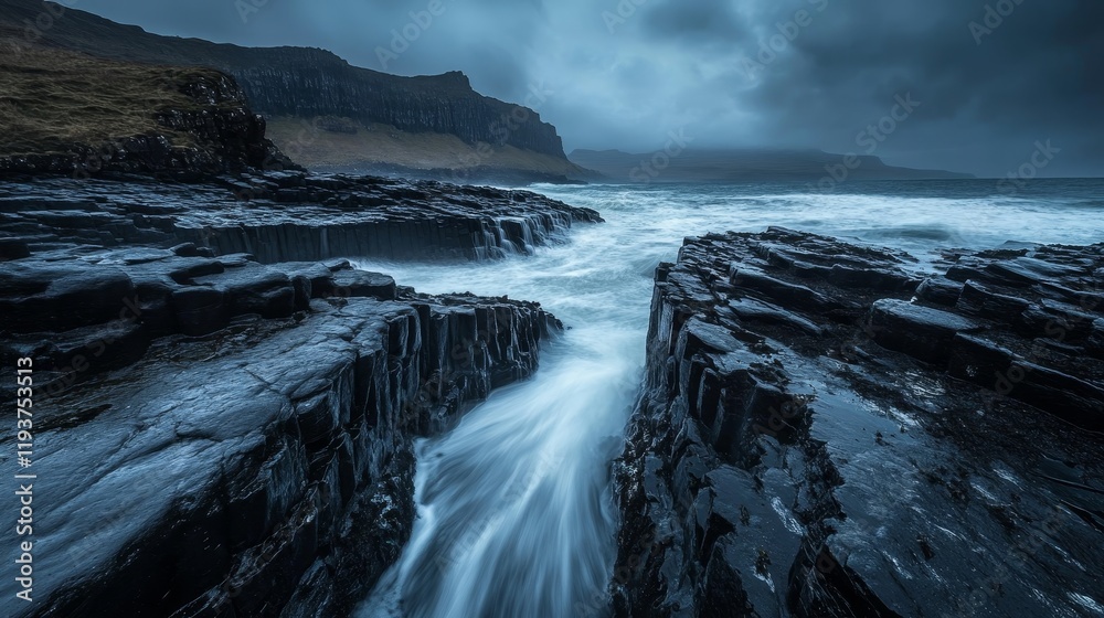 Waterfall with black stones, Portree, Isle of Skye, Scotland, United Kingdom, Europe Waterfall with black stones, Portree, Isle of Skye, Scotland, United Kingdom, Europe