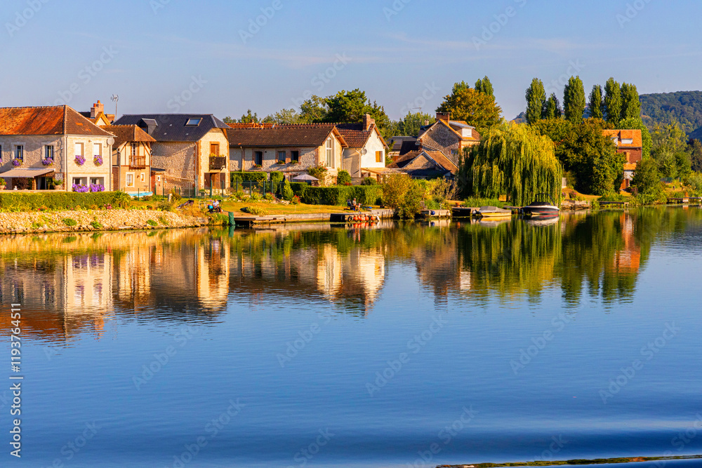 Fototapeta premium Beachfront homes situated on the Seine River in Normandy.