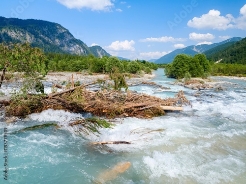 River Isar near Sylvenstein reservoir close to village. Fall in the Karwendel Mountains. Germany, Bavaria. photo