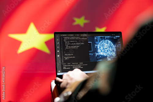 AI software on laptop used by Chinese security service programmer to commit terrorism attacks. Artificial intelligence tech used by CCP government to hack neighbor countries, isolated over China flag photo