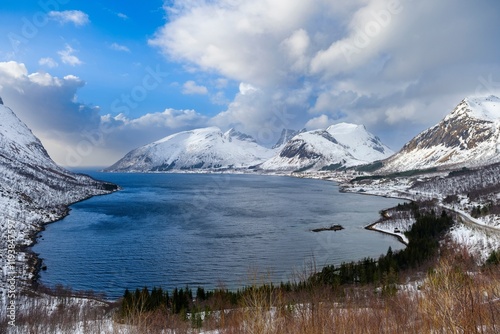 View over Bergsbotn, Bergsfjorden and Nordfjorden. The Senja island during winter in the north of Norway. photo