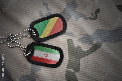 vintage army blank, dog tag with flag of and iran on the khaki texture background. military concept. photo