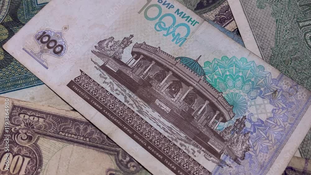 reverse view of the old uzbekistan 1000 som banknote 1997.