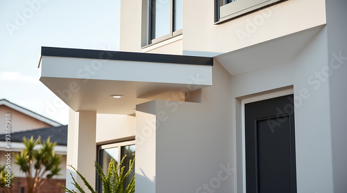 Modern House Exterior: Contemporary Home Design and Architecture.  Luxury Real Estate Property with Minimalist Facade and Elegant Entrance. New Home Construction photo