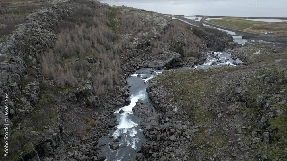 Landscape between mountains in Iceland next to forest Landscape between mountains in Iceland next to forest