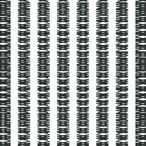 Texture in the form of symmetrical dense columns consisting of intersecting lines.