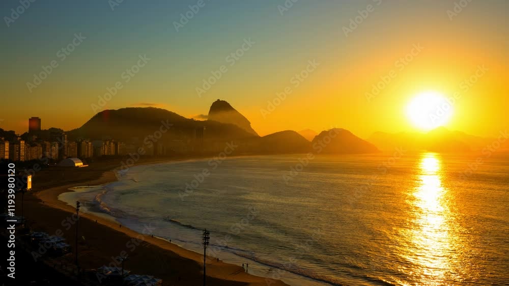 Aerial Lockdown Time Lapse Shot Of Copacabana Beach By Sugarloaf Mountain In City Against Dramatic Sky During Sunrise - Rio de Janeiro, Brazil