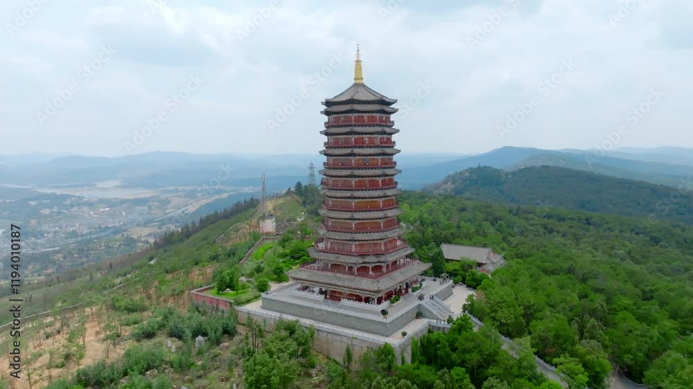 Captivating aerial views of Jingning Pagoda in Qujing showcasing stunning architectural details and surrounding landscape Captivating aerial views of Jingning Pagoda in Qujing showcasing stunning architectural details and surrounding landscape