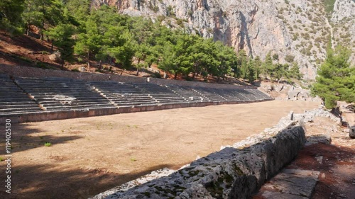 The well preserved stadium at Delphi, Greece photo