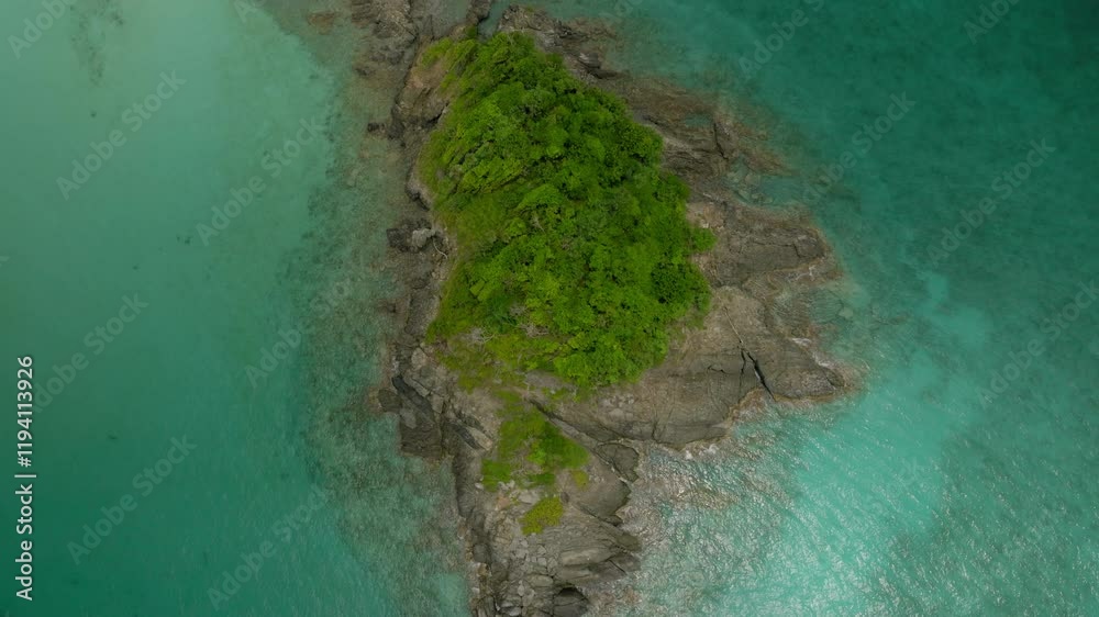 Aerial Forward Shot Of Green Plants On Small Island In Wavy Sea - VI, 
Trunk Bay, United States of America