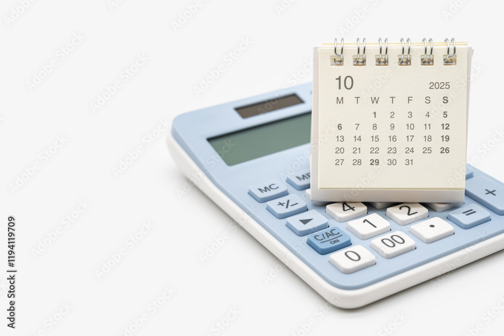 Simple desk calendar for 2025 OCTOBER on calculator. Calendar concept with copy space. 2025 OCT calendar. calculator and forecast for finances in 2025. Simple desk calendar for 2025 OCTOBER on calculator. Calendar concept with copy space. 2025 OCT calendar. calculator and forecast for finances in 2025.