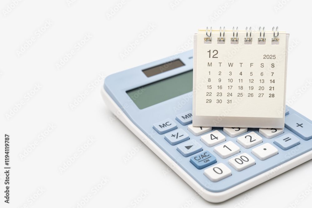 Desk calendar for 2025 DECEMBER on calculator. Calendar concept with copy space. 2025 DEC calendar. calculator and forecast for finances in 2025. Money, Budget, tax, investment and financial. Desk calendar for 2025 DECEMBER on calculator. Calendar concept with copy space. 2025 DEC calendar. calculator and forecast for finances in 2025. Money, Budget, tax, investment and financial.
