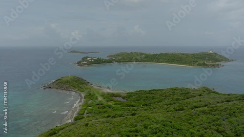 Wallpaper Mural Aerial Scenic Shot Of Tranquil Little Saint James Island, Drone Flying Forward Over Green Trees - VI, 
Little Saint James, United States of America Torontodigital.ca