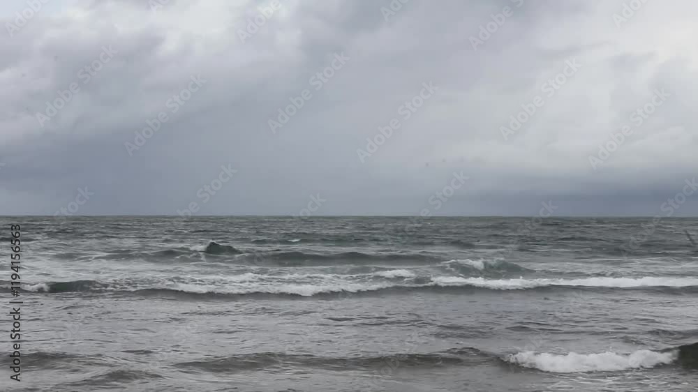 view of tidal ocean waves against a dark sky background view of tidal ocean waves against a dark sky background
