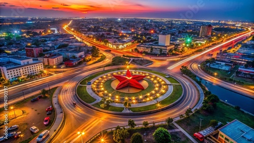 Cotonou Night Aerial: Red Star Roundabout, Benin - Low Light Photography photo