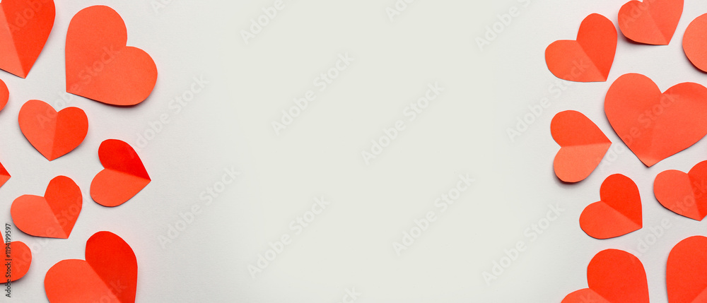 Obraz premium Red paper hearts on grey background. Valentine's Day celebration