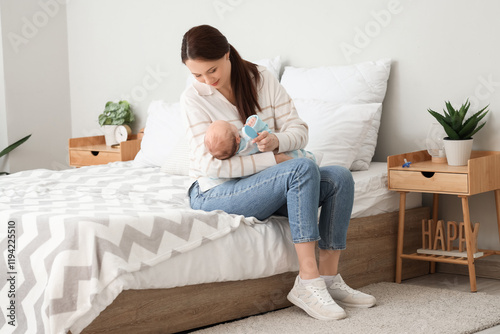 Young mother brushing her l...