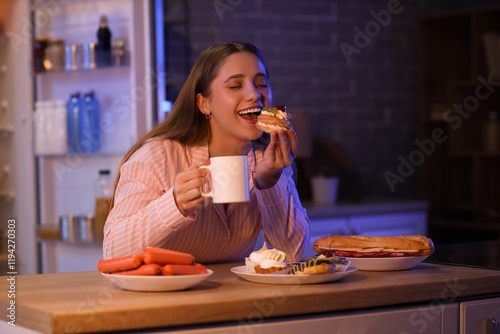 Happy young woman with cupc...