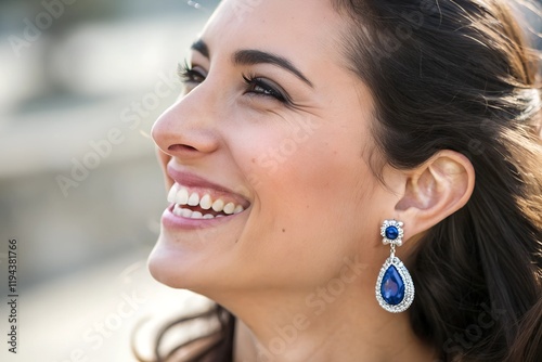Woman wearing sapphire earrings