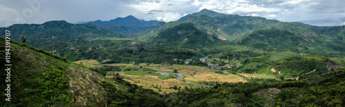 Foto The Landscape of Coffee Plantations and Rice Fields in Talang Donok Village with the Backdrop of Kerinci Seblat National Park