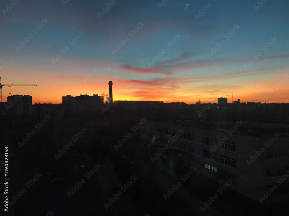 sunset over the city. yellow, pink, red sky sunset over the city. yellow, pink, red sky