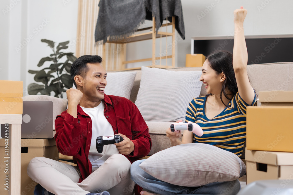 Young couple sitting on the sofa in their new house, happily using a laptop, enjoying each other's company, and creating joyful memories in their fresh, cozy home environment Young couple sitting on the sofa in their new house, happily using a laptop, enjoying each other's company, and creating joyful memories in their fresh, cozy home environment