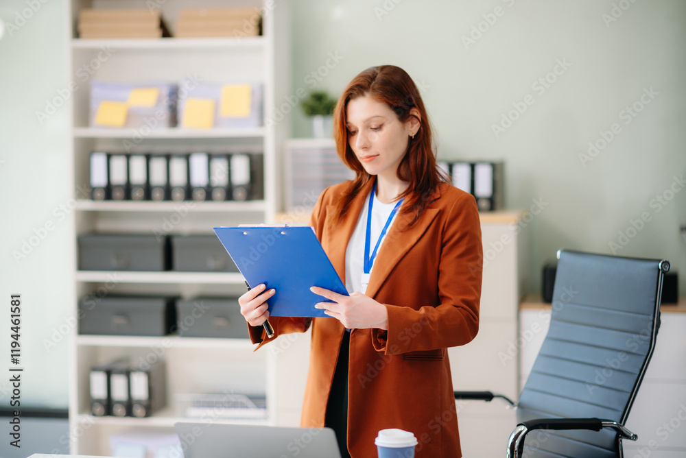 businesswoman working with working notepad, tablet and laptop documents talking on the smartphone, tablet businesswoman working with working notepad, tablet and laptop documents talking on the smartphone, tablet