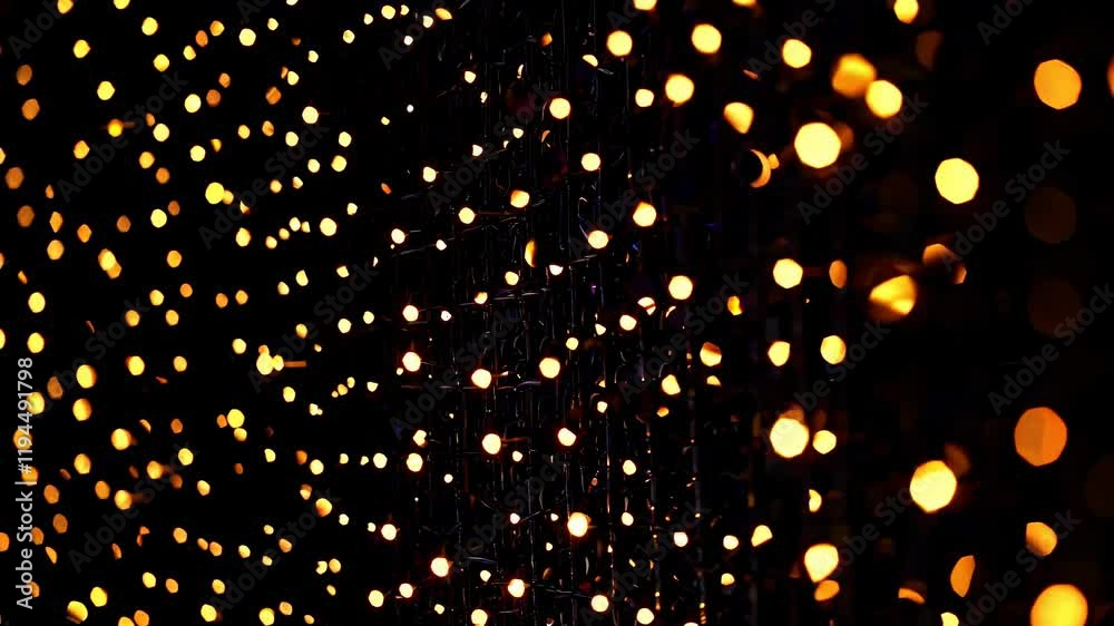 Golden bokeh light display creates a magical atmosphere during a festive celebration Golden bokeh light display creates a magical atmosphere during a festive celebration