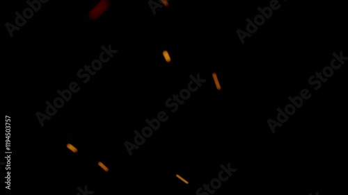 Dramatic close-up of intense flames with glowing ember particles on a black background, ideal for cinematic, fire, or abstract projects