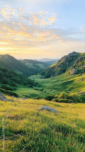 Dawn serenity over gentle mountain slopes scenic valley view nature photography tranquil landscape soft hues in sky