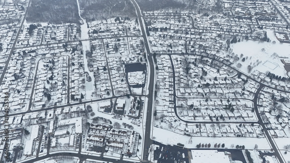 Fototapeta premium Aerial view of Kitchener, Ontario, covered in snow during winter