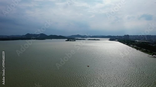 Explore the beautiful natural scenery of Yunlong Lake in Xuzhou, Jiangsu during a calm afternoon photo