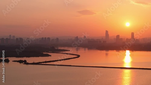 Breathtaking Kunming Dianchi sunrise captured from above, showcasing the stunning landscape and vibrant colors photo