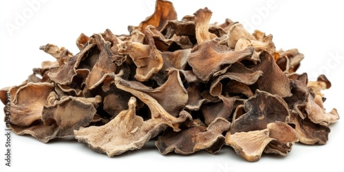 Dehydrated Jew's Ear mushrooms in a natural pile, predominantly earthy brown tones against a white background, showcasing their unique texture and shape.