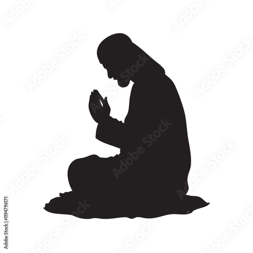 silhouette of a person sitting on the floor praying