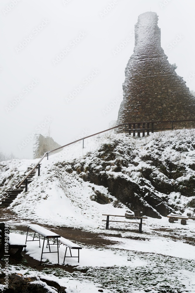 Exit to the upper courtyard from the lower one in winter. Stary Jicin. Moravia. Czech Republic.