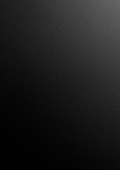 Dark matte textured surface background with subtle light gradient for elegant and minimalist design use