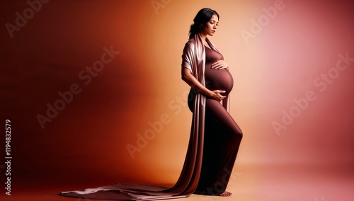 Pregnant woman in a silky robe gently holding her belly. Ideal for maternity ads, prenatal care, and wellness promotions. Copyspace for text