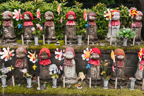 Jizo Statues, The Guardian Deity of Children and Travelers at Zojo-Ji, Tokyo, Japan photo