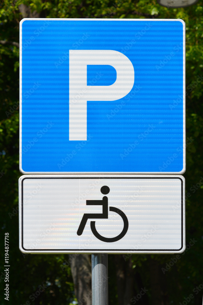 A traffic sign indicating a single parking space reserved for persons with disabilities, featuring the international wheelchair symbol A traffic sign indicating a single parking space reserved for persons with disabilities, featuring the international wheelchair symbol