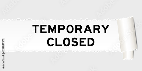 Ripped gray paper background that have word temporary closed under torn part