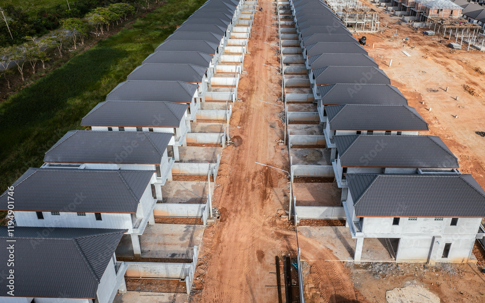 Fototapeta premium Aerial view of the residential site under construction. Building houses.