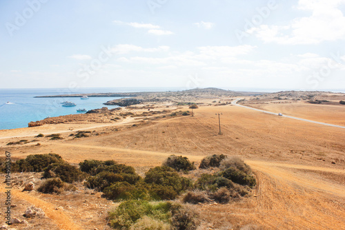 Long distance view of Cape Cavo Greco in summer