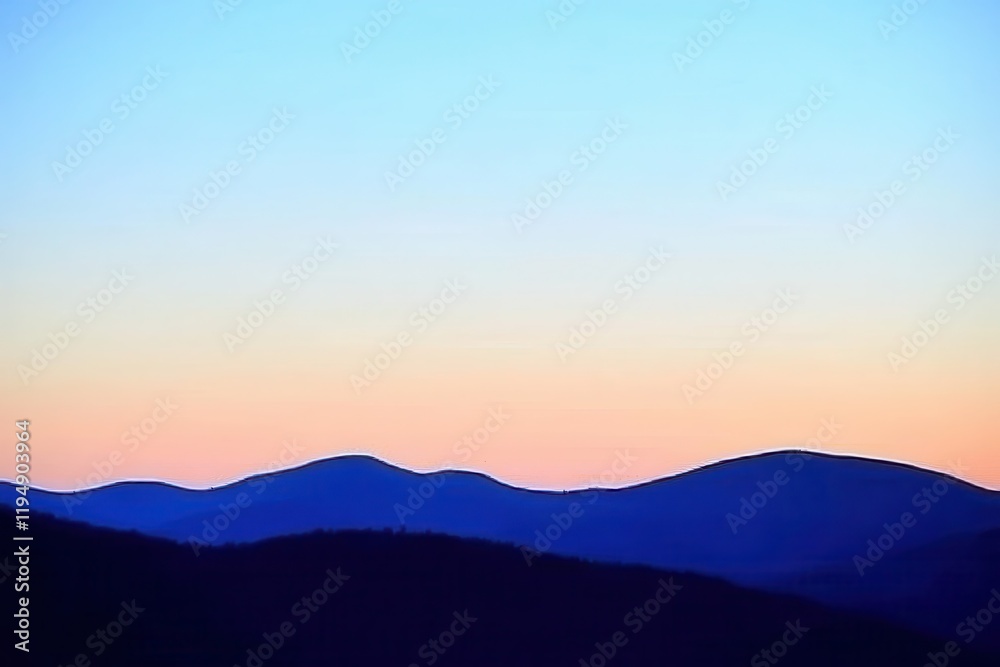 Mountain Range Gradient: Mountains in silhouette with a gradient sky from dark blue at the peak to a light blue at the base Mountain Range Gradient: Mountains in silhouette with a gradient sky from dark blue at the peak to a light blue at the base