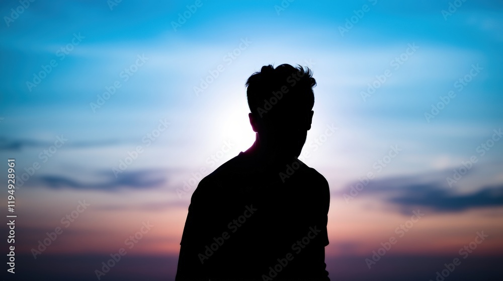 Silhouette Against a Colorful Sunset Sky Silhouette Against a Colorful Sunset Sky