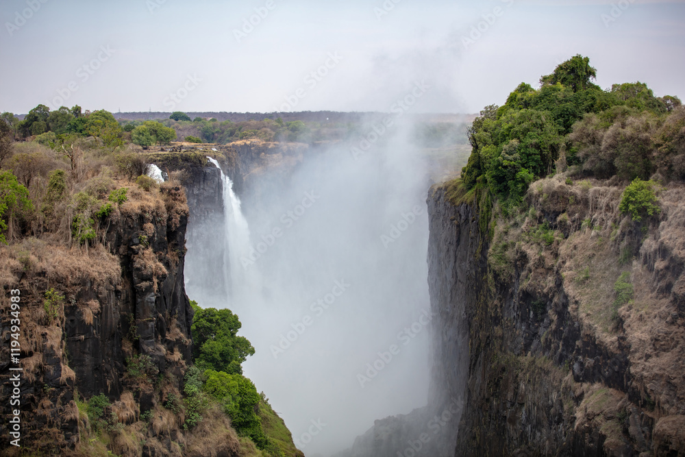 Victoria Falls, waterfall on the Zambezi River between Zambia and Zimbabwe. Africa Victoria Falls, waterfall on the Zambezi River between Zambia and Zimbabwe. Africa