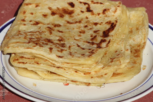 A close-up of the traditional Moroccan flatbread known as msemmen or msemen photo