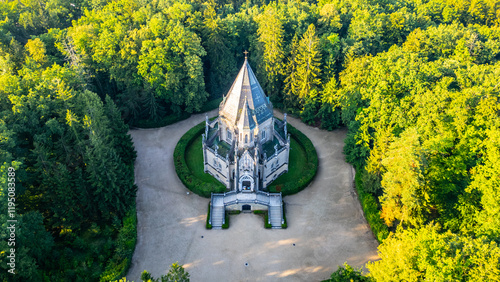 Nestled in lush greenery, the Schwarzenberg Tomb in Domanin, Czechia, offers a peaceful retreat photo