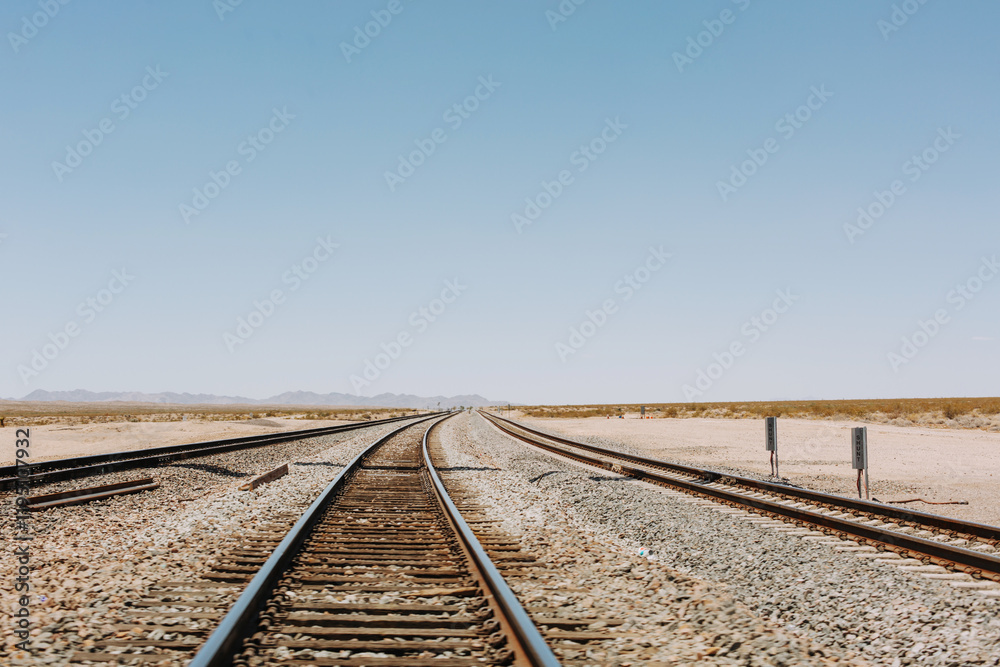 Railroad crossing on a road in the Mojave Desert in the Southwestern United States. California. Railroad crossing on a road in the Mojave Desert in the Southwestern United States. California.