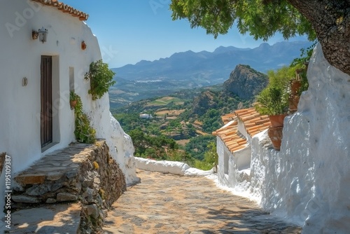 Picturesque white village overlooking serene andalusian landscape